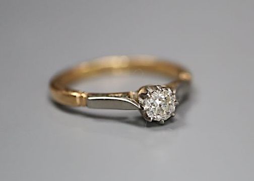 An 18ct and plat, solitaire diamond ring, size M, gross 2.6 grams,